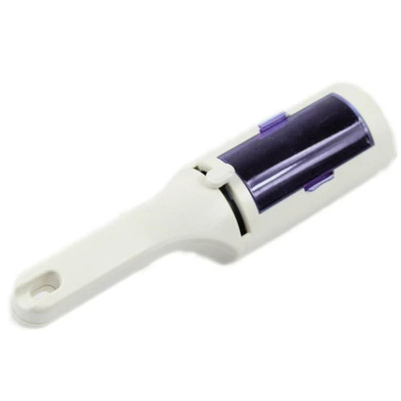 White and purple electrostatic self-cleaning pet hair remover brush for dog and cat fur on furniture and clothing.