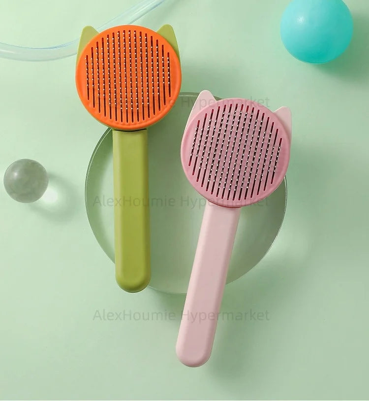 Two colorful cat-shaped self-cleaning grooming brushes for removing loose pet hair and detangling fur effectively.