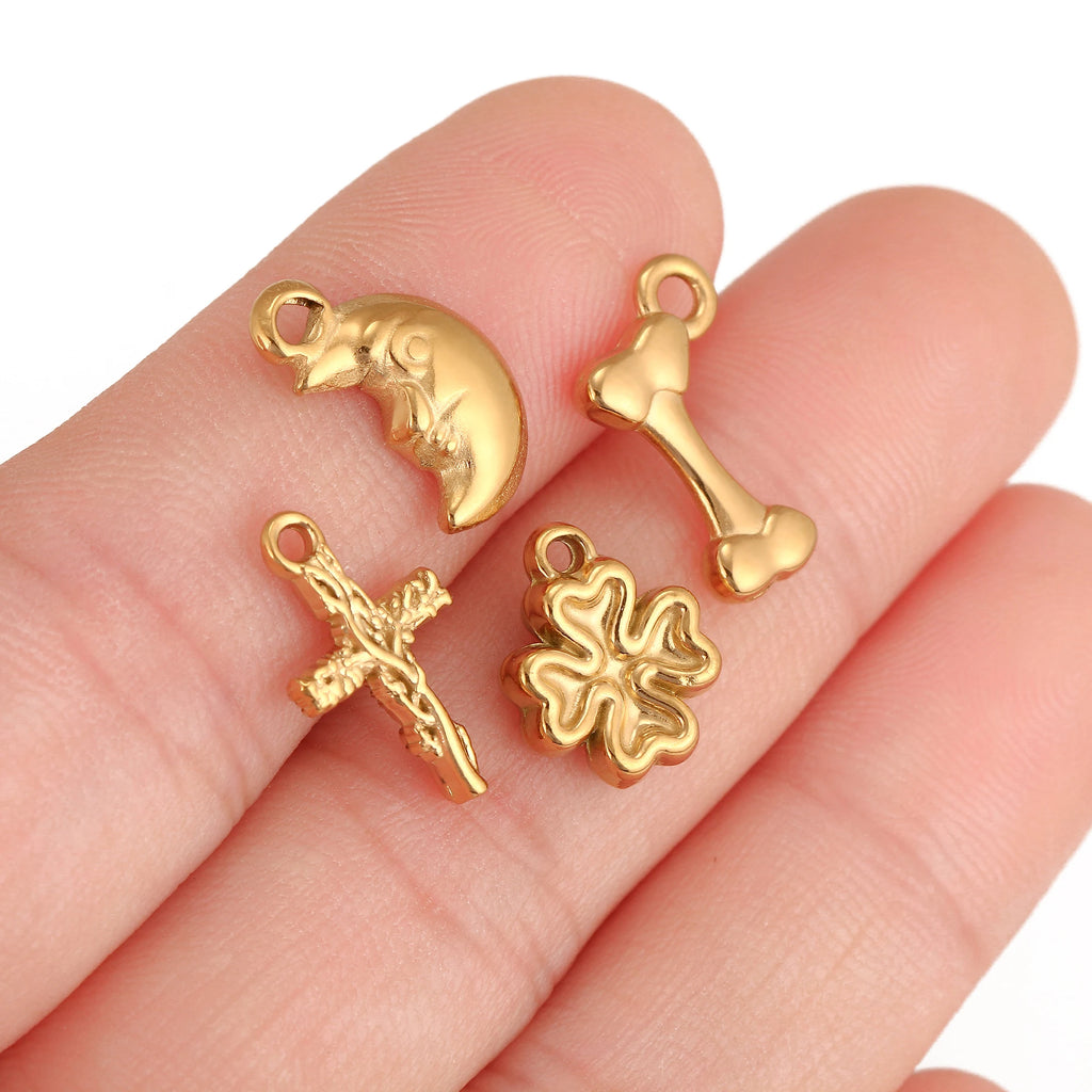 Gold stainless steel pet-themed charms for DIY jewelry making, including a bone pendant for necklaces and bracelets.