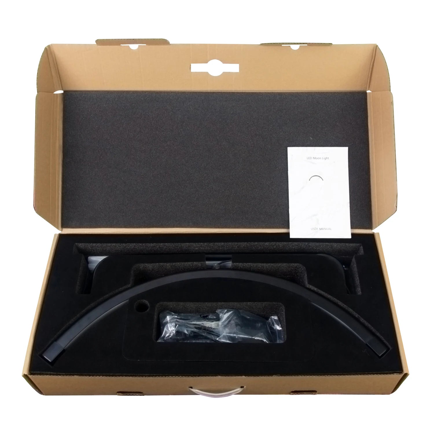 Black semi-circular LED moon light base and components in foam-lined cardboard packaging with a user manual.