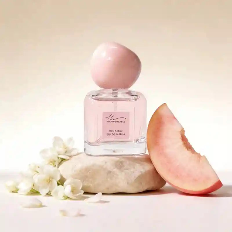 Hope Christine Peach Eau de Parfum for women: 50ml square glass bottle, pink round cap, peach & floral notes.