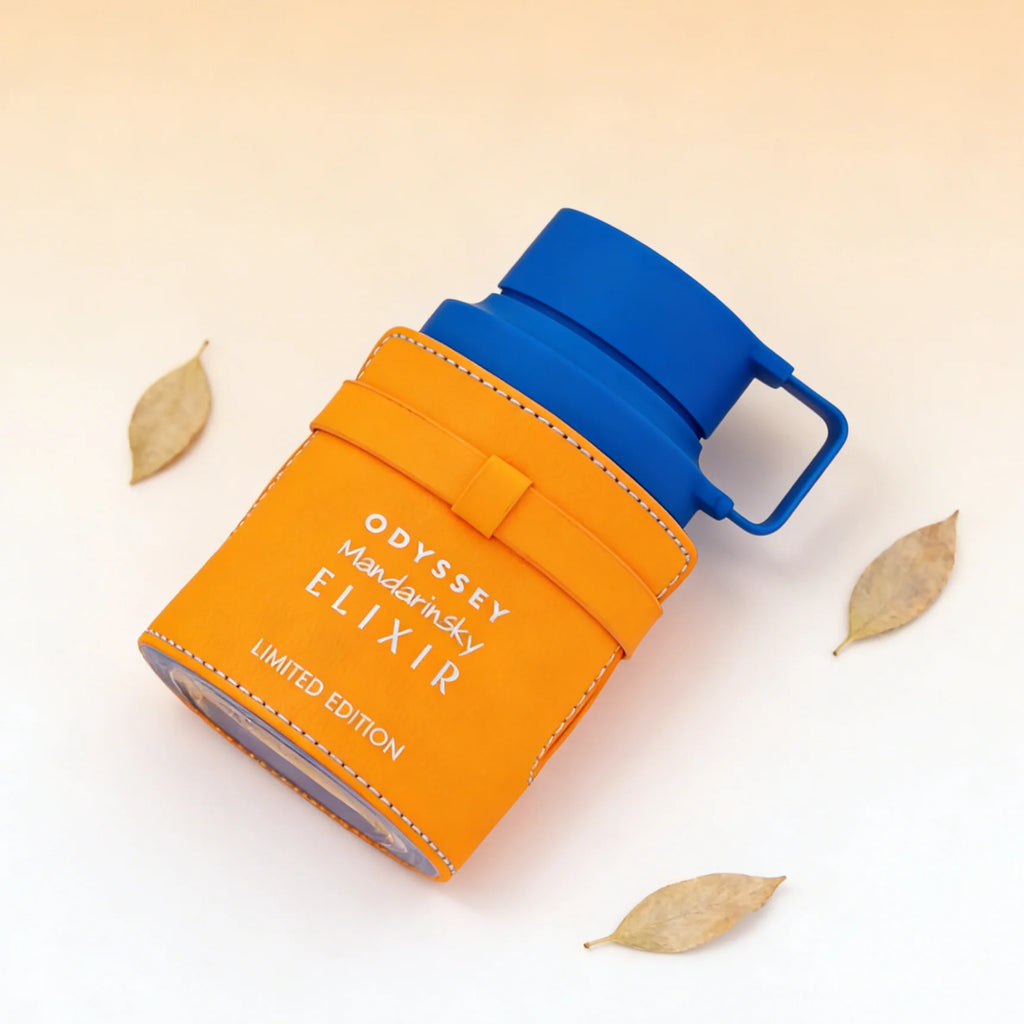 Armaf Odyssey Mandarinsky Elixir EDP: Men’s fresh mandarin citrus spicy scent in a unique orange leather-wrapped bottle.