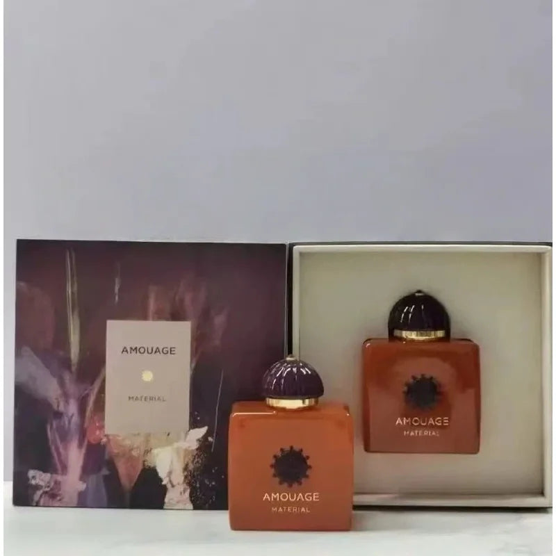 Amouage Material unisex EDP: square amber bottles with dome caps, luxury woody oriental niche perfume 100ml gift set.