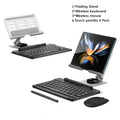 Silver metal tablet stand with black wireless keyboard, mouse, and touch pen for mobile device workspace setup.
