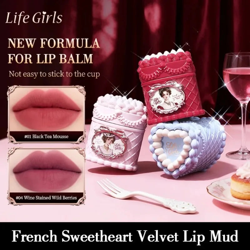 Vintage-style strawberry cake lip mud with soft-focus matte finish. Highly pigmented velvet lip gloss in berry shades.