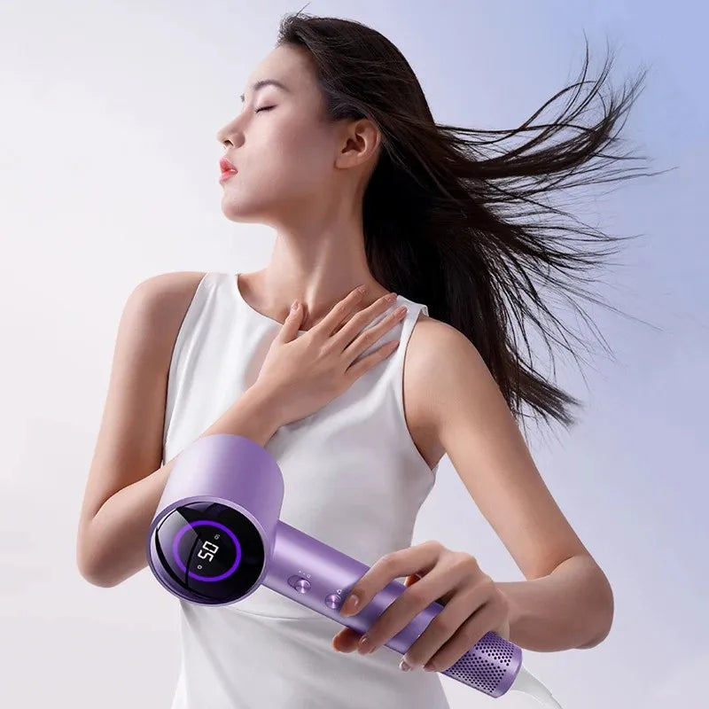 Purple high-speed ionic hair dryer with LED display, 1600W power, and nozzle for professional hair styling.