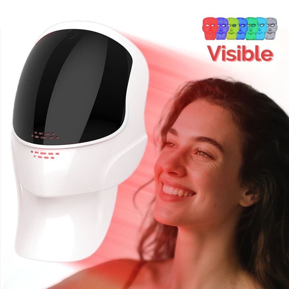White LED light therapy facial mask with a black visor, emitting red light for skin treatment.