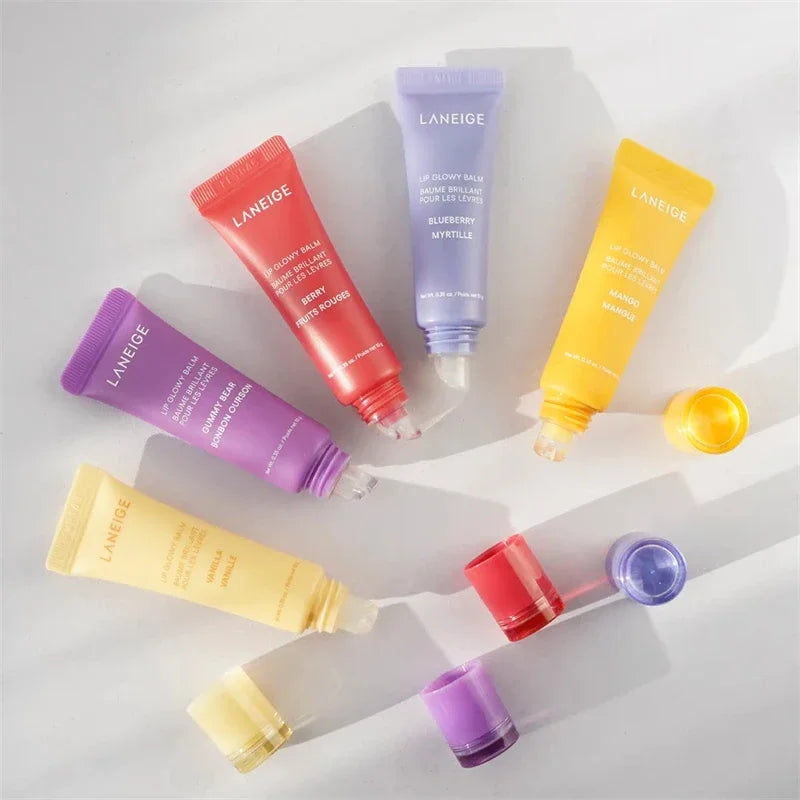 Laneige Lip Glowy Balm set: colorful moisturizing serum lip tubes in Berry, Blueberry, Mango, Gummy Bear, and Vanilla.