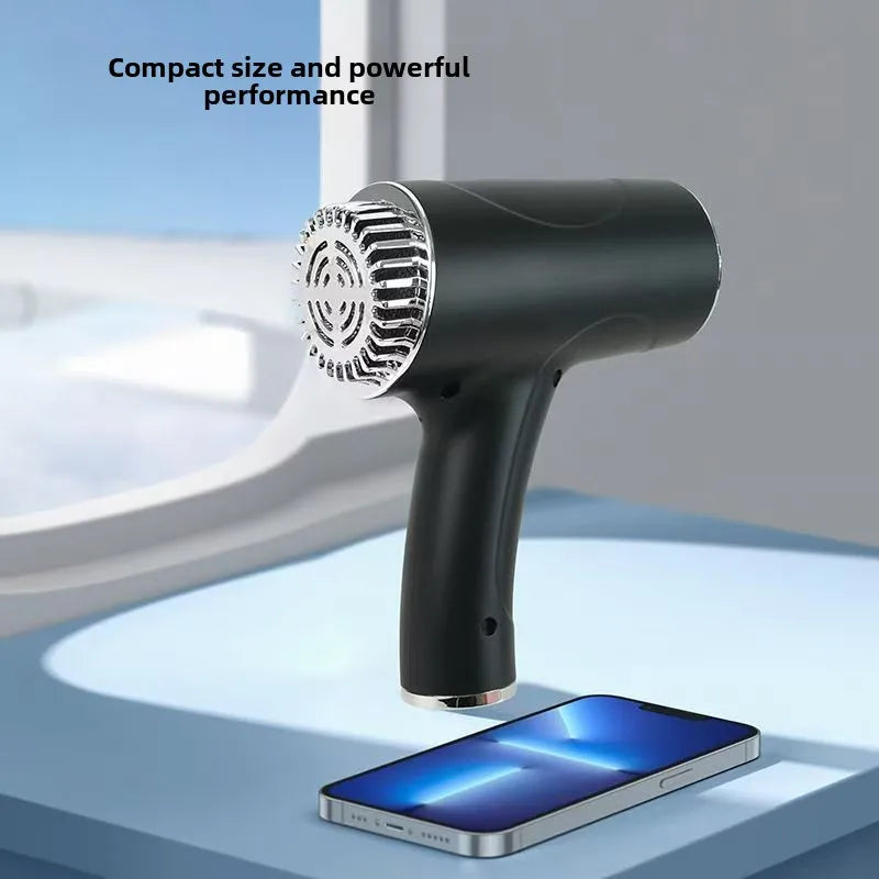 Portable wireless black hair dryer with chrome nozzle, compact design, and powerful ionic airflow for travel.