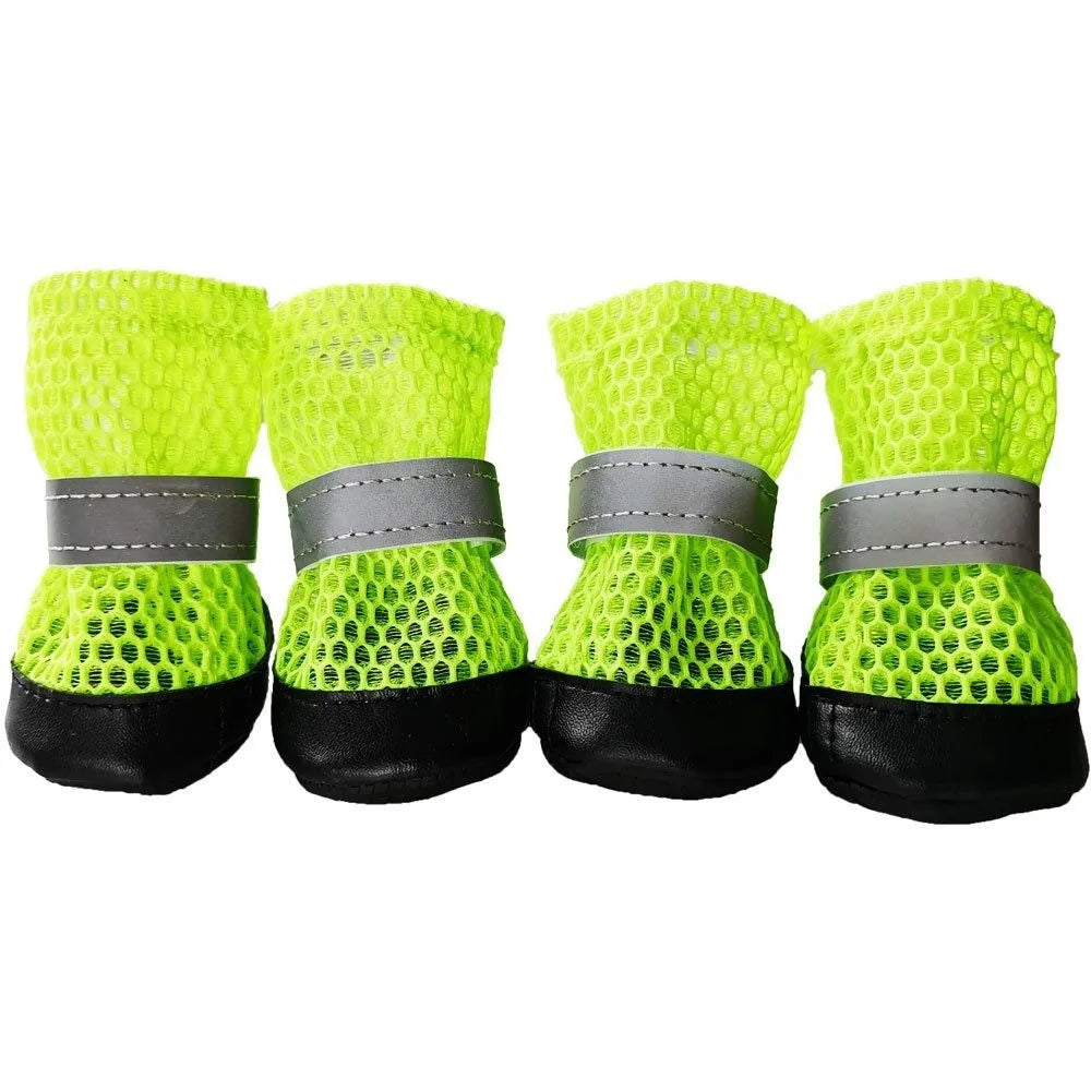 4pcs neon green breathable mesh dog shoes with reflective straps, anti-slip soles for safe outdoor paw protection.