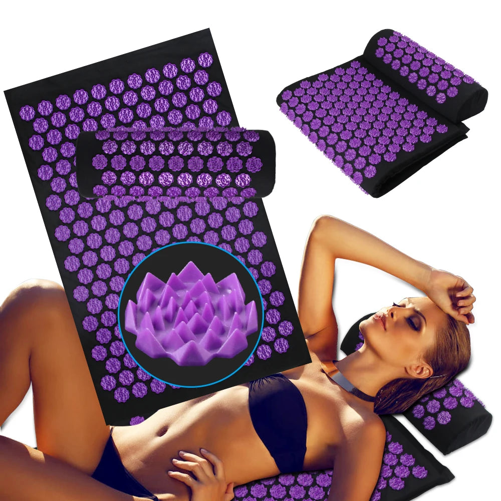 Black acupressure mat and pillow set with purple plastic spiked lotus-shaped massage points.