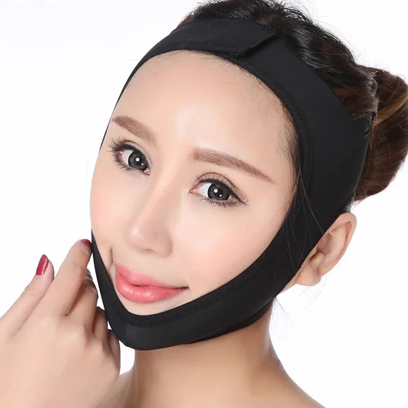 A woman wears a black, elastic V-line face slimming bandage strap that lifts the chin and cheeks.