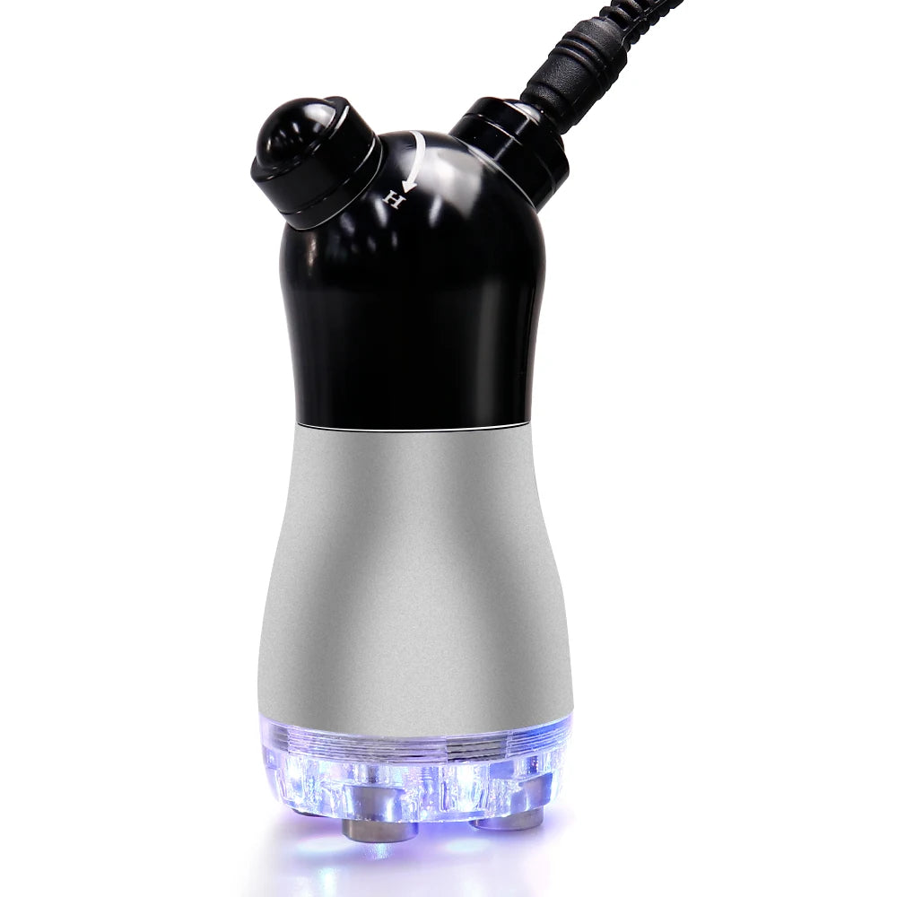 Ultrasonic cavitation slimming device with black and silver handle, glowing blue LED light, and metal contact head.