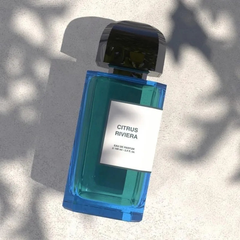 Citrus Riviera 100ml EDP: Luxury unisex perfume in a sleek blue rectangular glass bottle with a premium black cap.