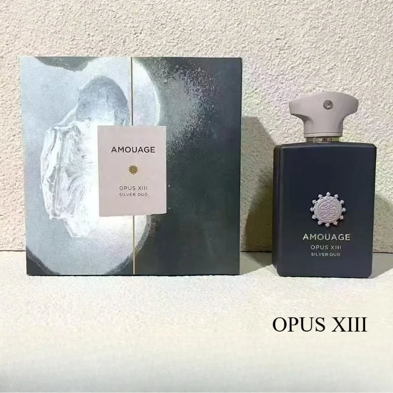 Amouage Opus XIII Silver Oud 100ml fragrance bottle and matching grey box with artistic silver-toned metallic finish.