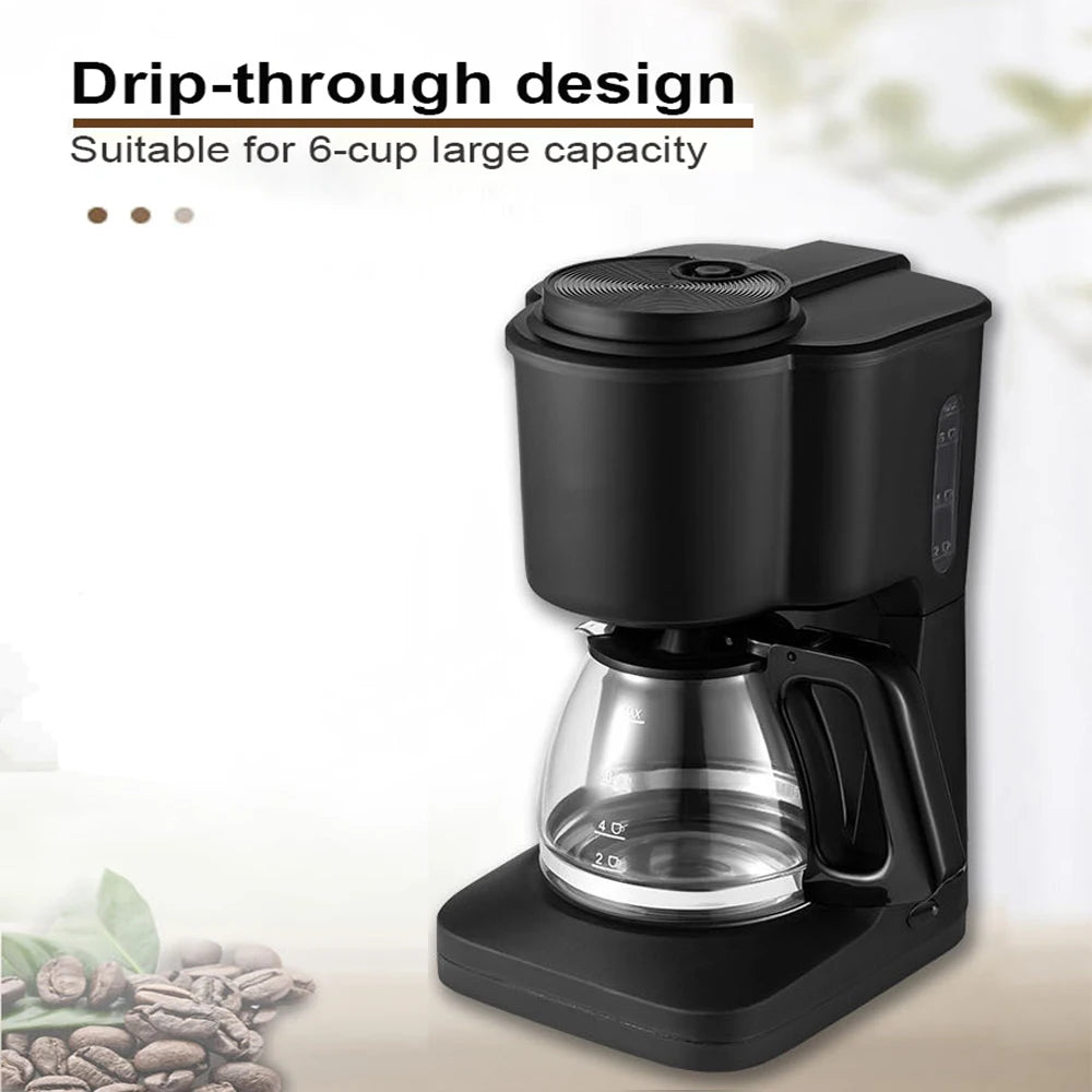 Matte black 6-cup drip coffee maker with glass carafe and water level indicator for home brewing.