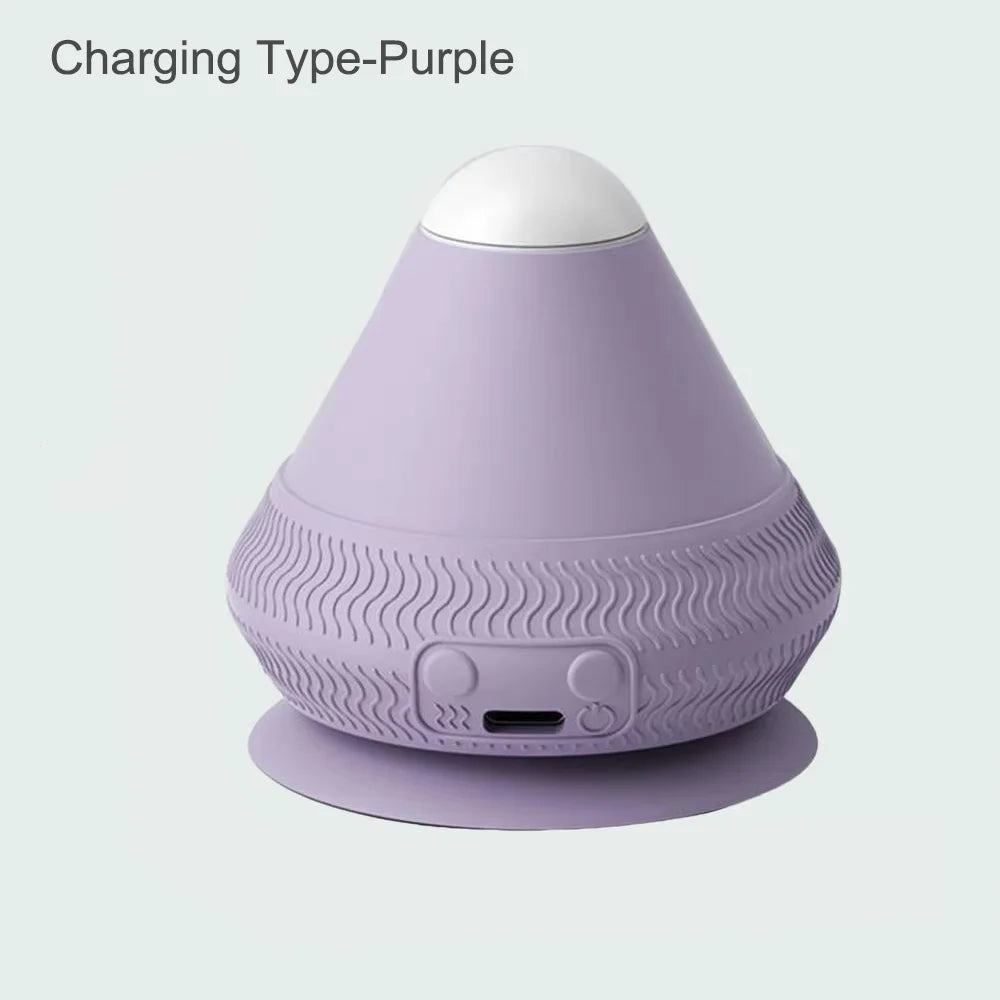 Purple, cone-shaped silicone wellness massager with a white top, suction base, USB charging port, and button controls.