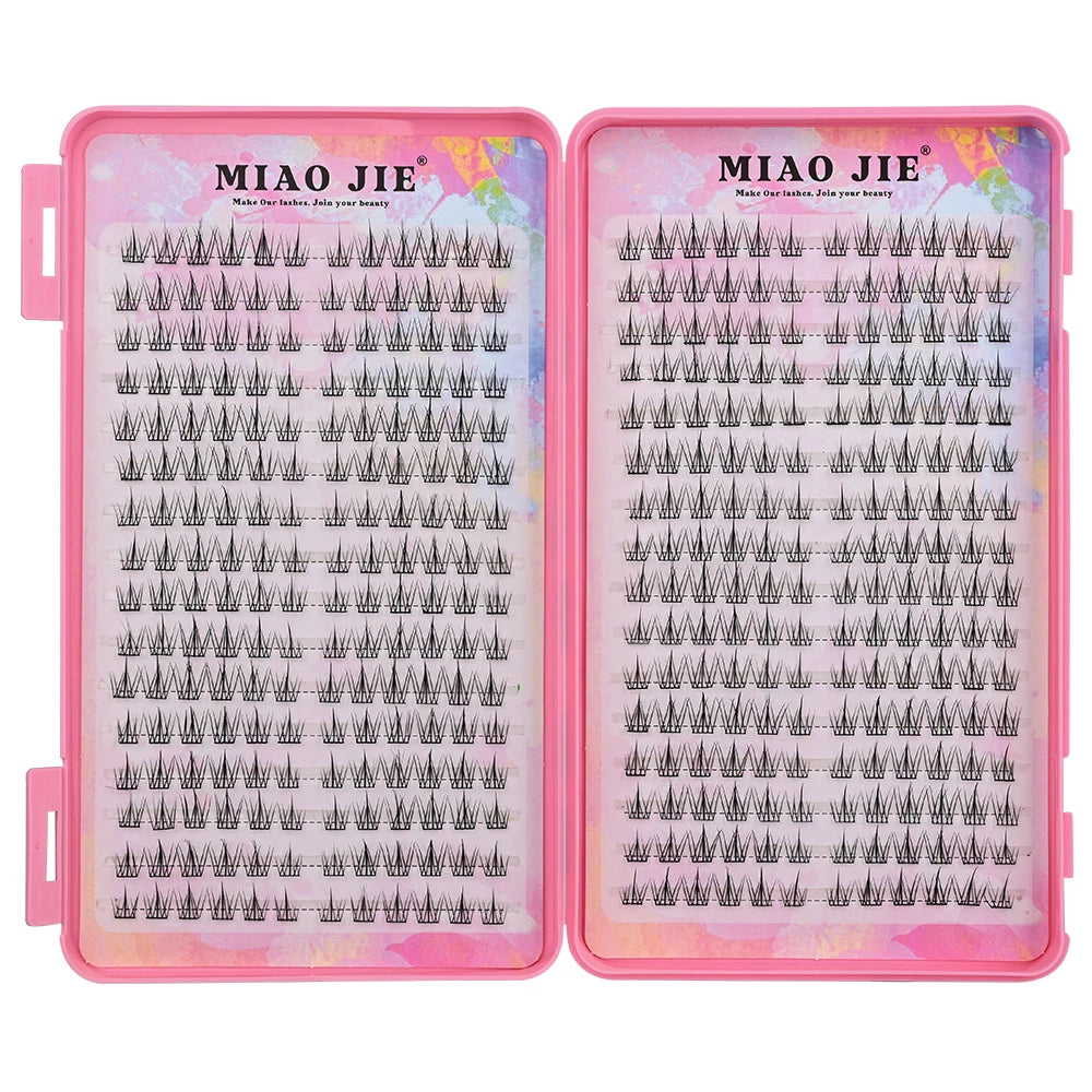 Tidesmit MIAOJIE black cat-eye cluster lashes in a pink plastic tray, featuring a natural C-curl 10-14mm design.