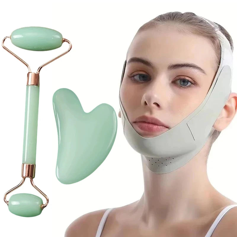 A person wearing a light green V-shaped facial mask, next to a matching green jade roller and heart-shaped gua sha tool.