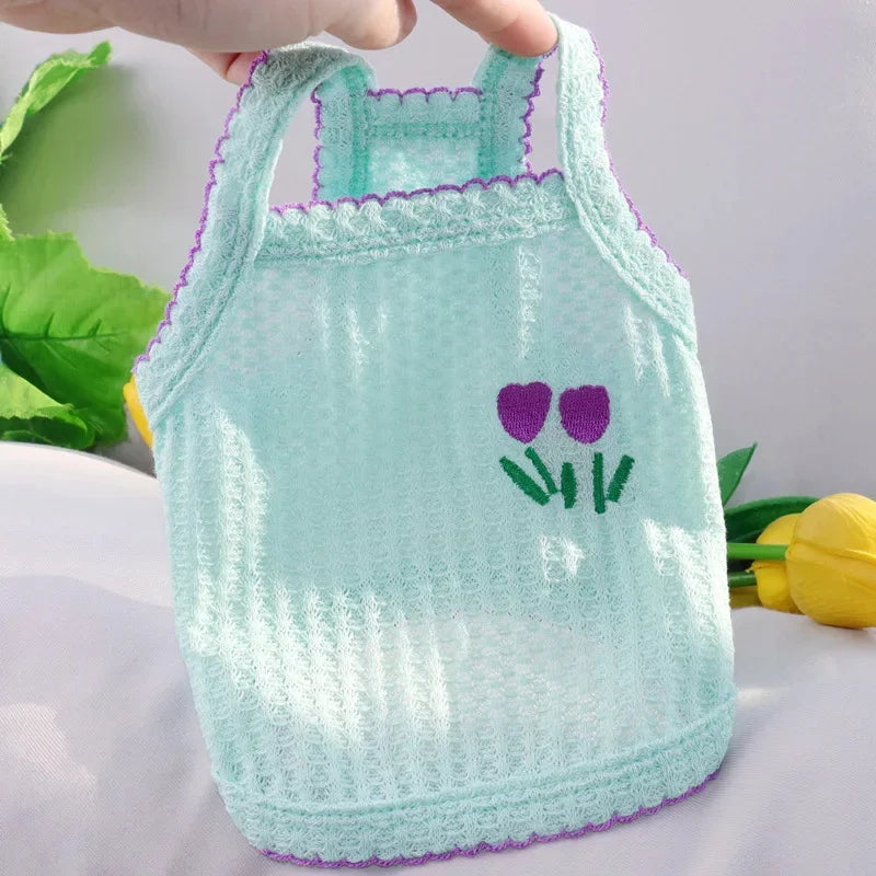 Soft, breathable light blue pet tank top for small dogs and cats with purple tulip embroidery for summer comfort.