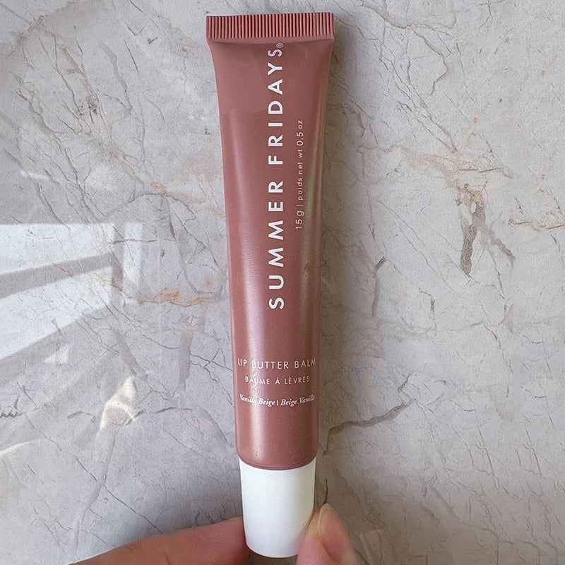 Tidesmit Summer Friday Vanilla Beige moisturizing lip balm swatch showing smooth transparent mirror gloss texture