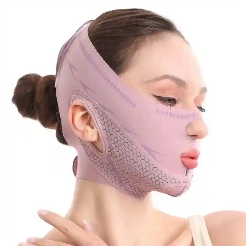 A woman wearing a mauve V-line face slimming compression strap featuring a textured honeycomb pattern.