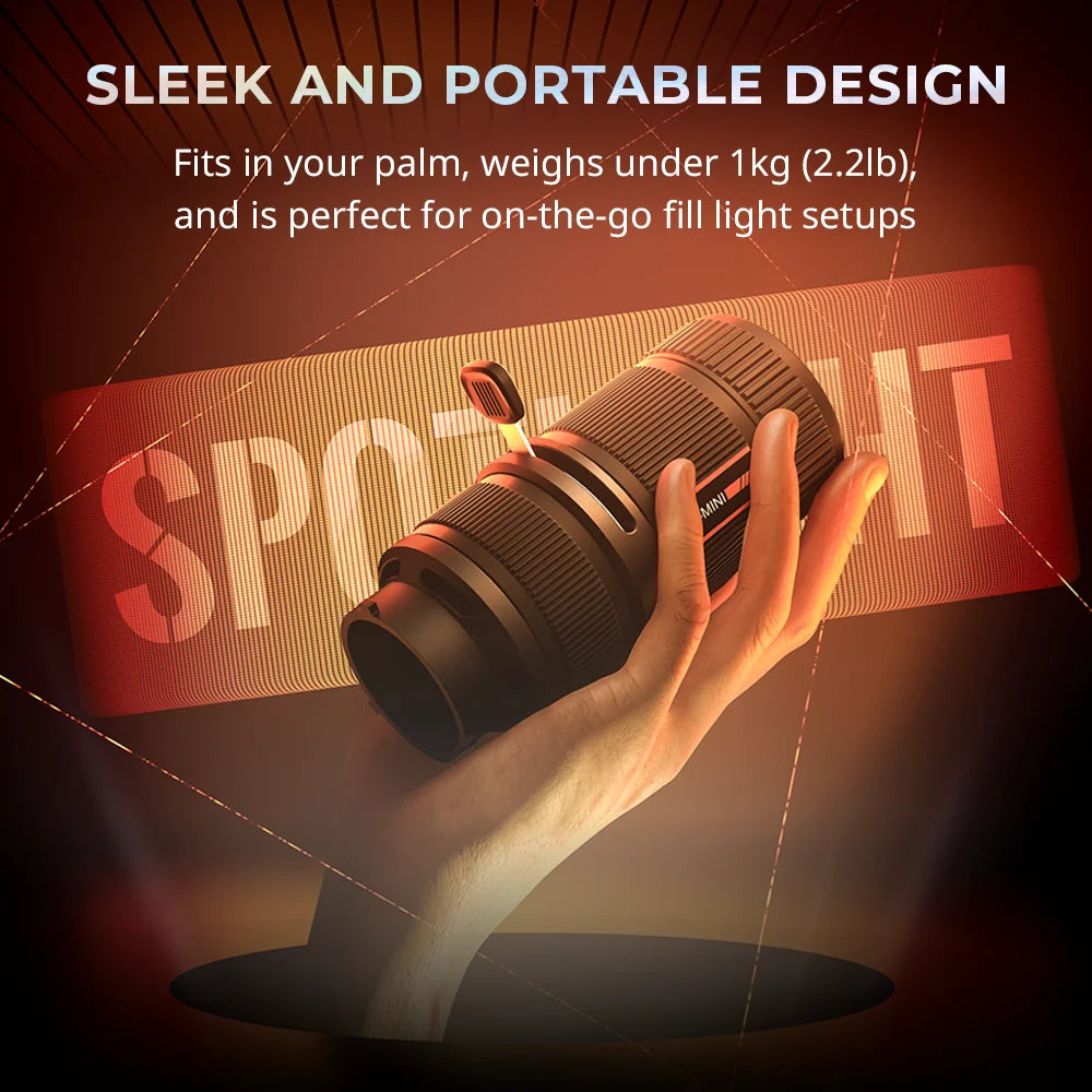 Compact cylindrical black LED spotlight held in a hand, designed for portable, on-the-go photography fill lighting.