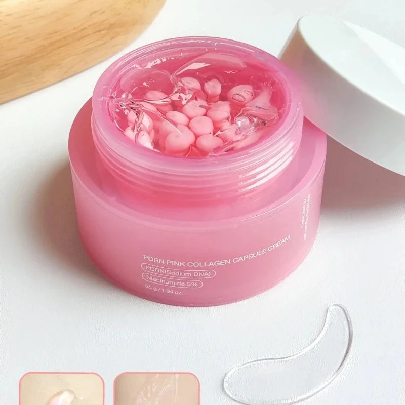 Open pink jar of Korean collagen capsule cream with small pink spheres suspended in clear gel and a white lid.