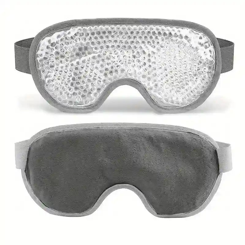 Gray eye mask showing both sides: one with clear gel beads and one with soft, plush gray fabric.