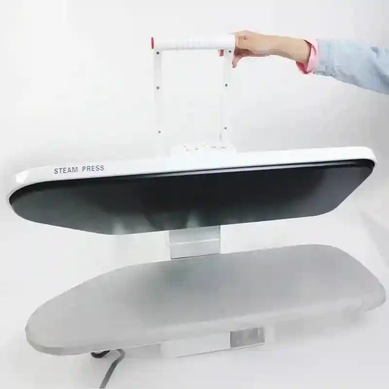 Tidesmit Model 810 commercial steam iron showing large surface area and 1600W heating plate for professional laundry