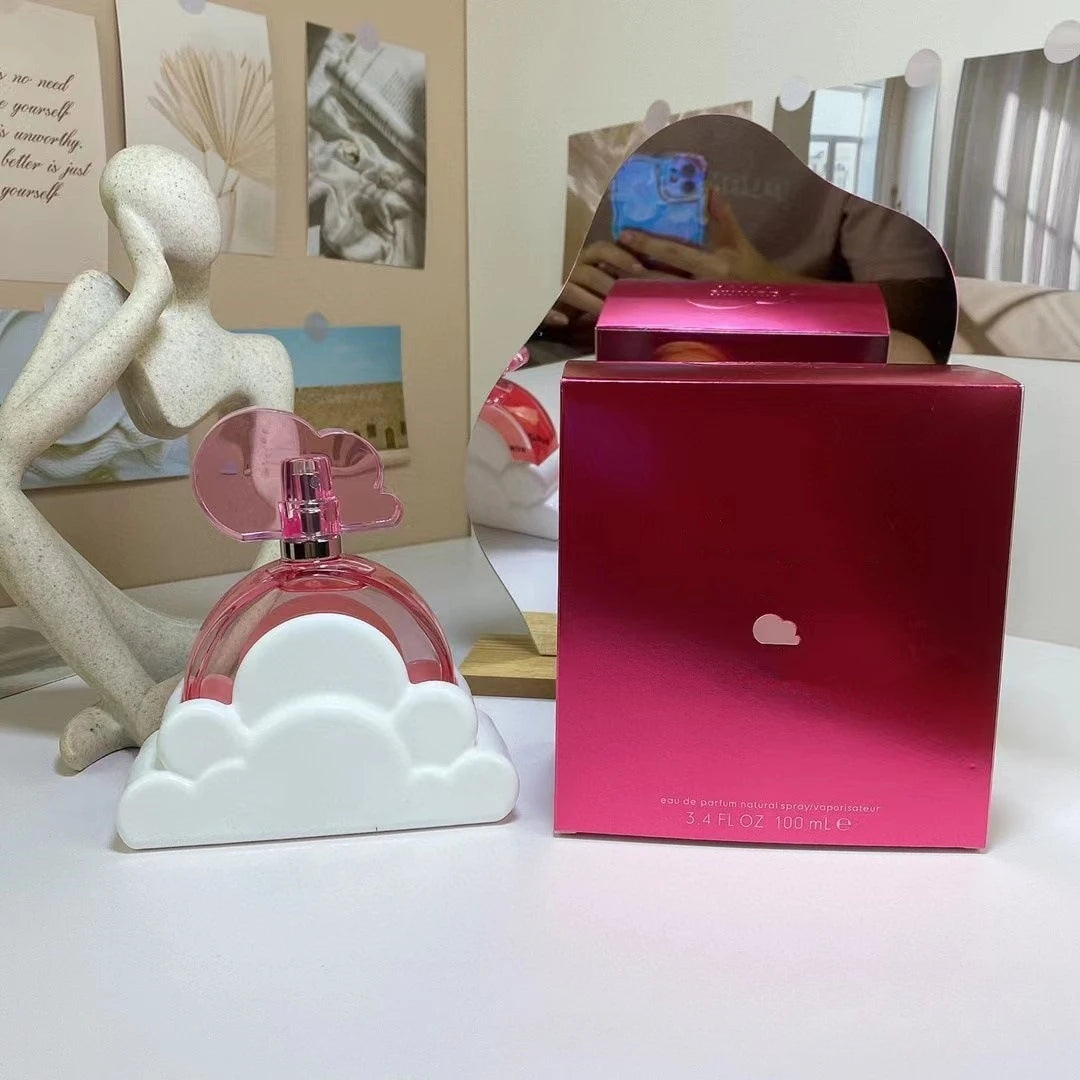 Classic Brand Ariana White Grand Cloudmass 100ml EDP ladies' perfume in a pink cloud-shaped bottle with display box.