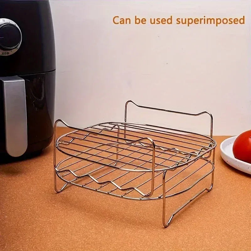 Square air fryer grilling rack with wire sides and a protective skewer stand