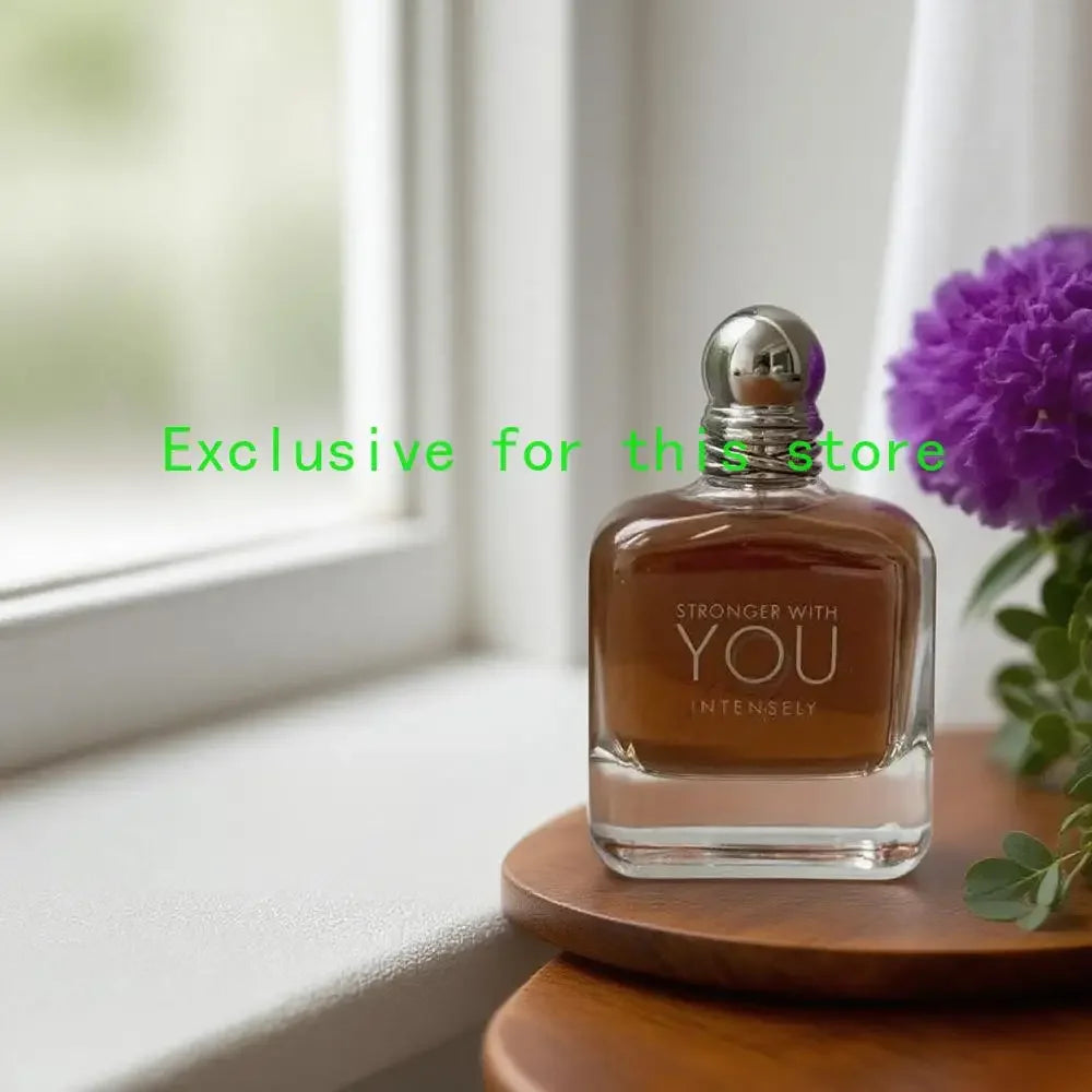 Stronger With You Intensely 100ml EDP: Unisex oud perfume in a square glass bottle with a round silver cap.