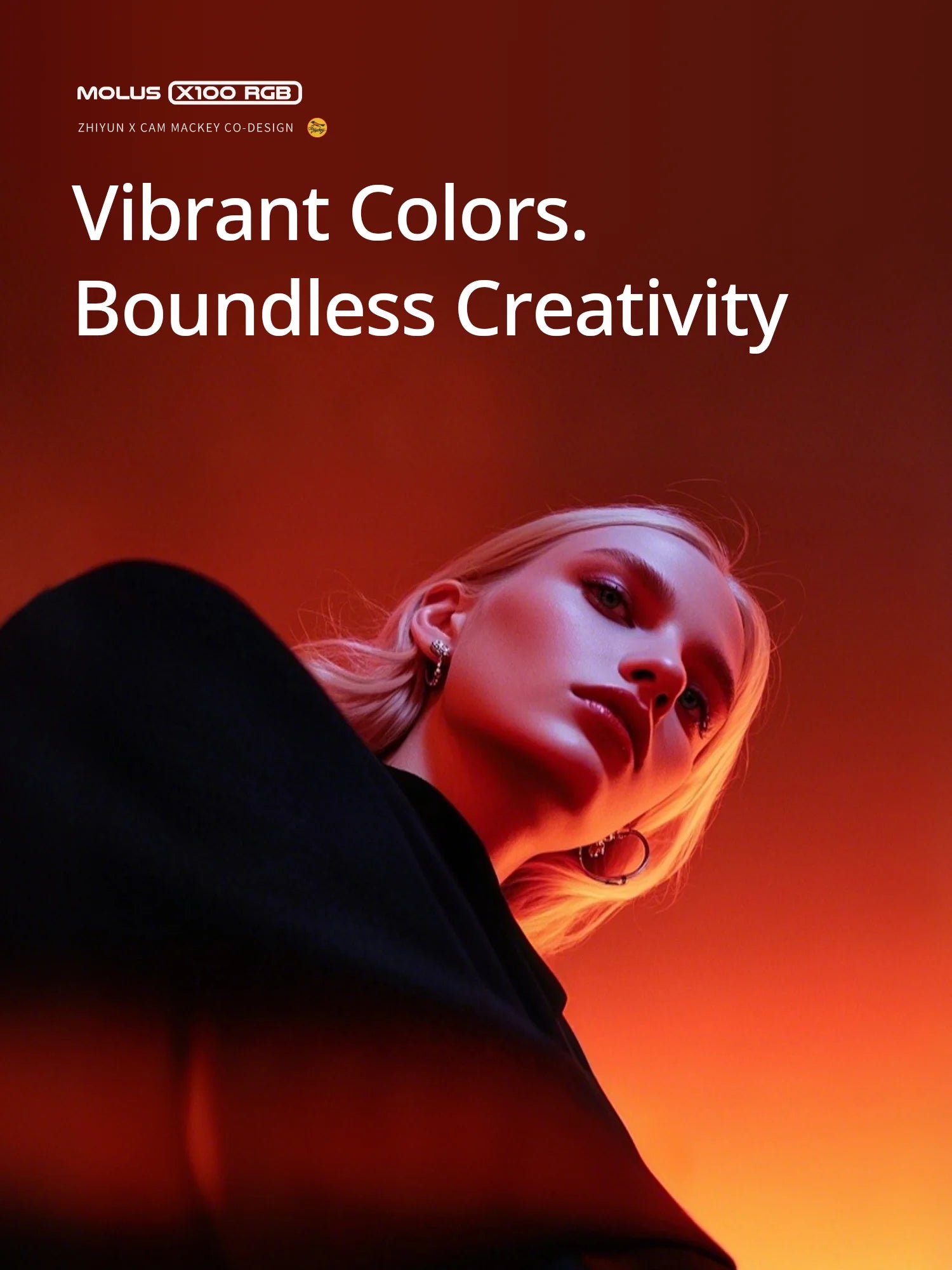 Molus X100 RGB portable pocket light providing creative, vibrant red and orange studio lighting for portrait