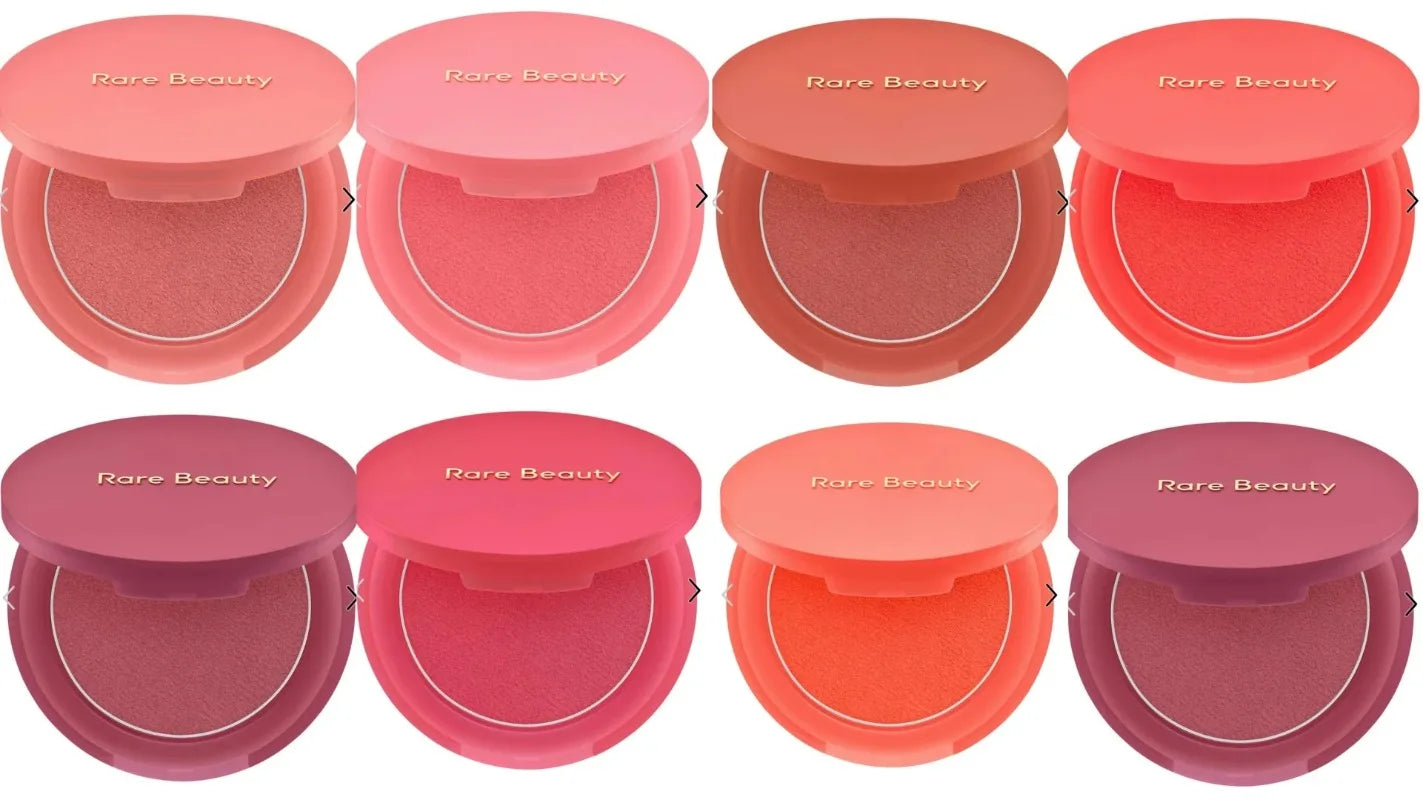 Rare Beauty Soft Pinch Luminous Powder Blush collection in various vibrant shades with a smooth, velvety finish.