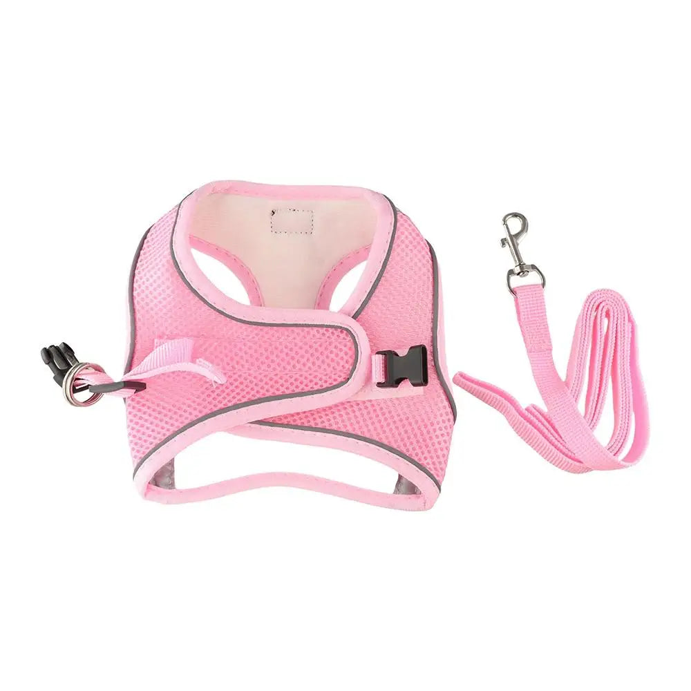 Pink reflective mesh dog harness and leash set for small pets. Adjustable, anti-escape design for safe walking.