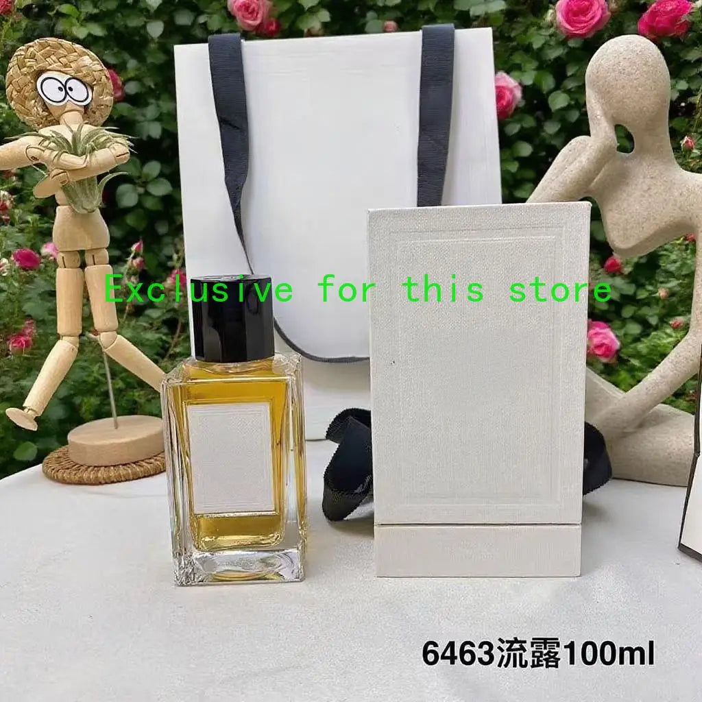Dansparis 100ml unisex perfume. Rectangular glass bottle, black cap, long-lasting EDP fragrance in elegant gift box.