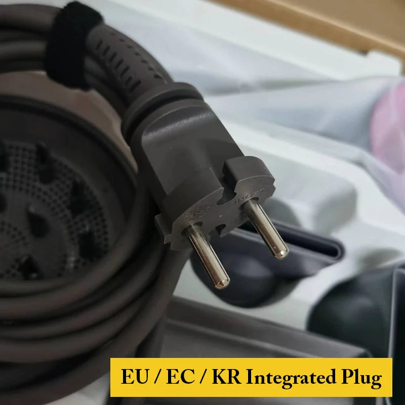 Grey hair dryer power cord with EU/KR integrated plug and hair styling attachments in box for salon or home use.