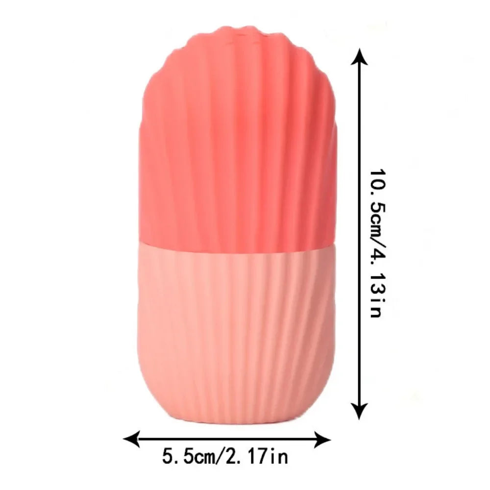 Coral and peach silicone ice face roller with ridged, shell-like texture and dimension labels on a white background.