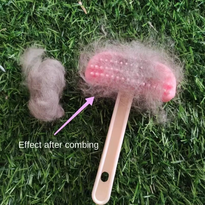 Pink silicone brush removing excess fur from a rabbit or small pet for effective grooming and coat maintenance.