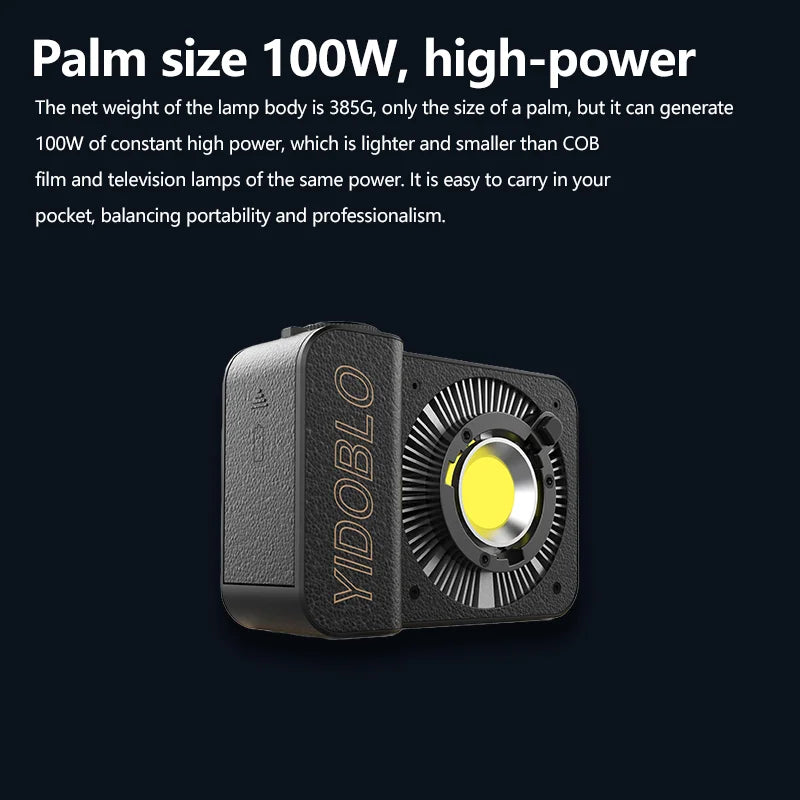 Compact 100W COB LED video light. Rectangular, palm-sized, black textured metal housing with a circular cooling fan.