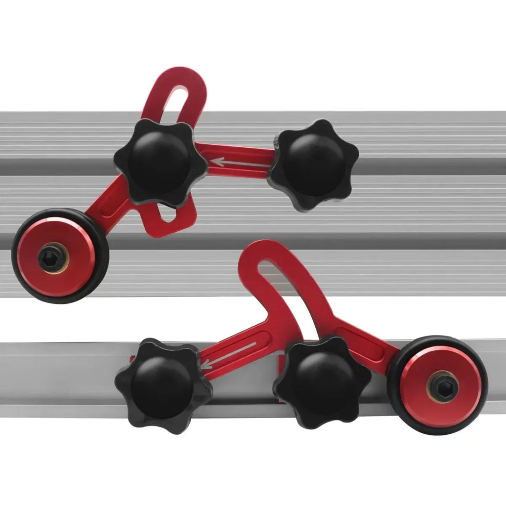 Two-piece red bearing roller stock guide set with black clamp knobs and guide rollers
