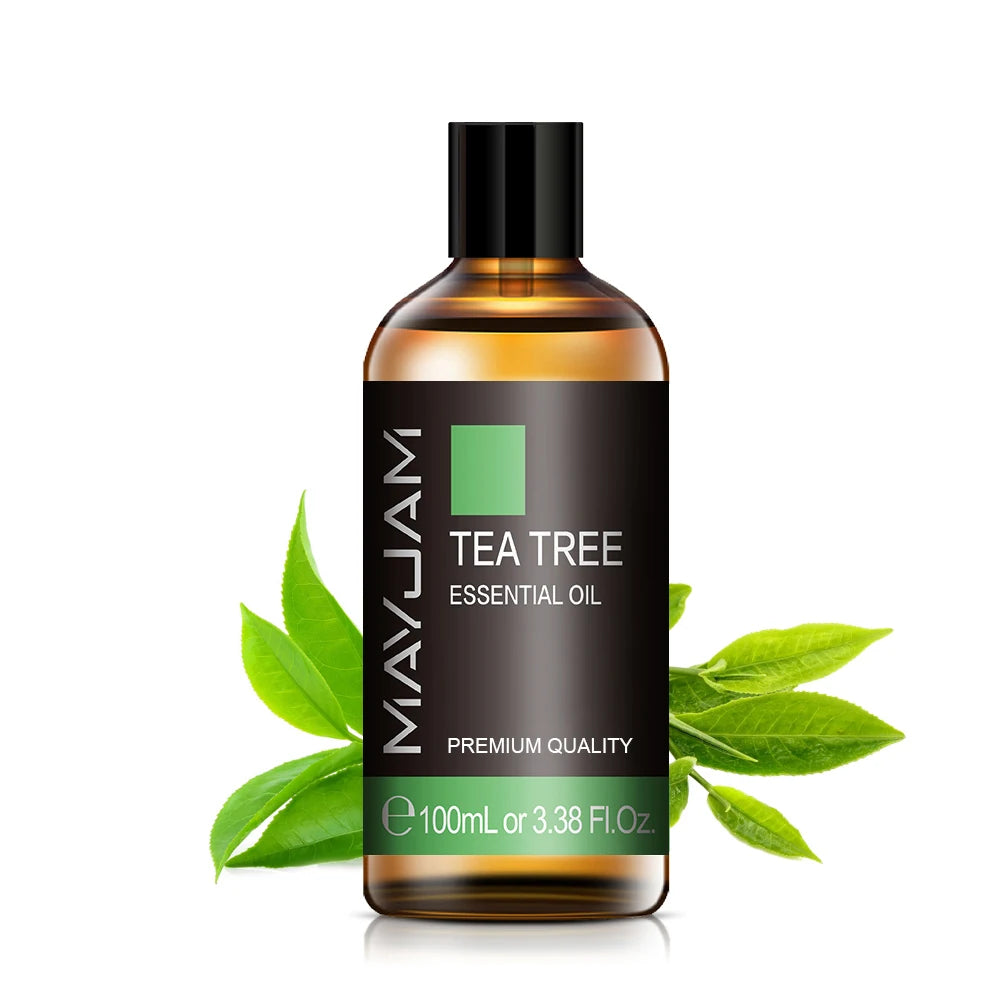 Tea tree essential oil bottle, amber glass with black pump cap, 100ml label