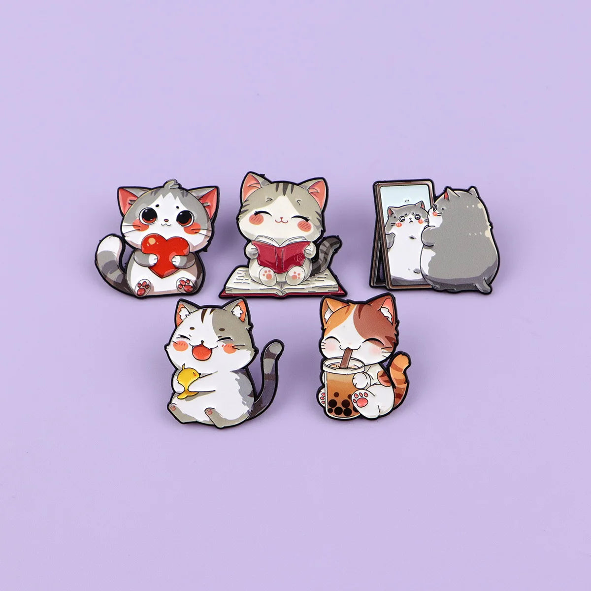 Cute set of 5 colorful enamel cat pins for backpacks or jackets. Fun kawaii kitty brooches, perfect fashion gift.