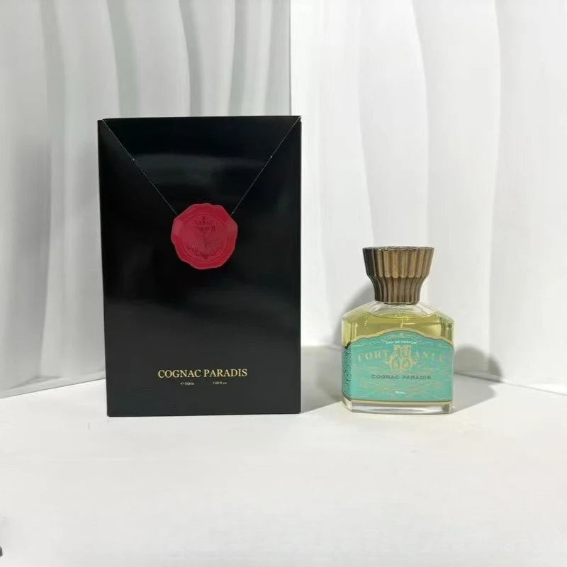 Tidesmit 50ml unisex long lasting perfume body spray with cognac, peach, rum, and oriental woody amber fragrance.