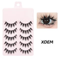 Five pairs of wispy black false eyelashes on a pink tray, shown applied to upper and lower lash lines.