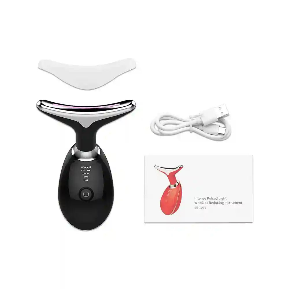 Black EMS facial massager with silver curved head, protective cover, USB cable, and product manual on white background.