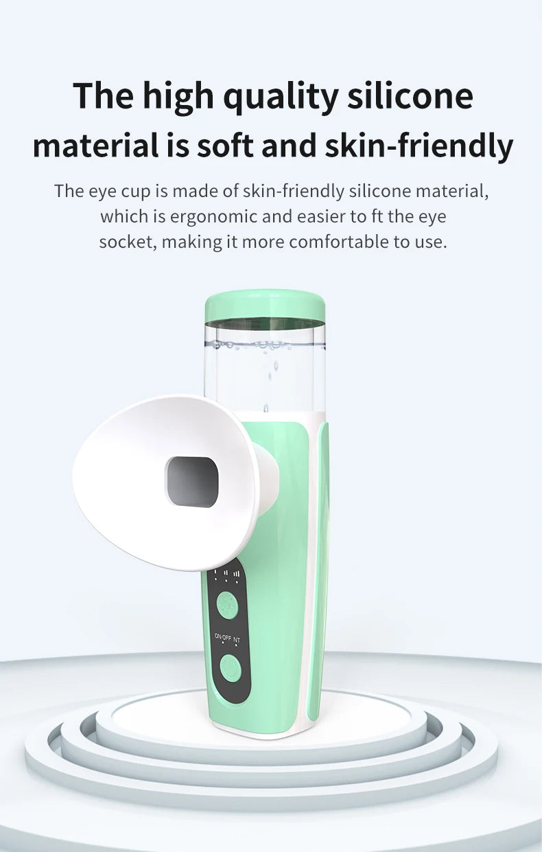 Portable green USB eye misting moisturizer with soft ergonomic silicone eye cup for hot and cold eye care treatment.