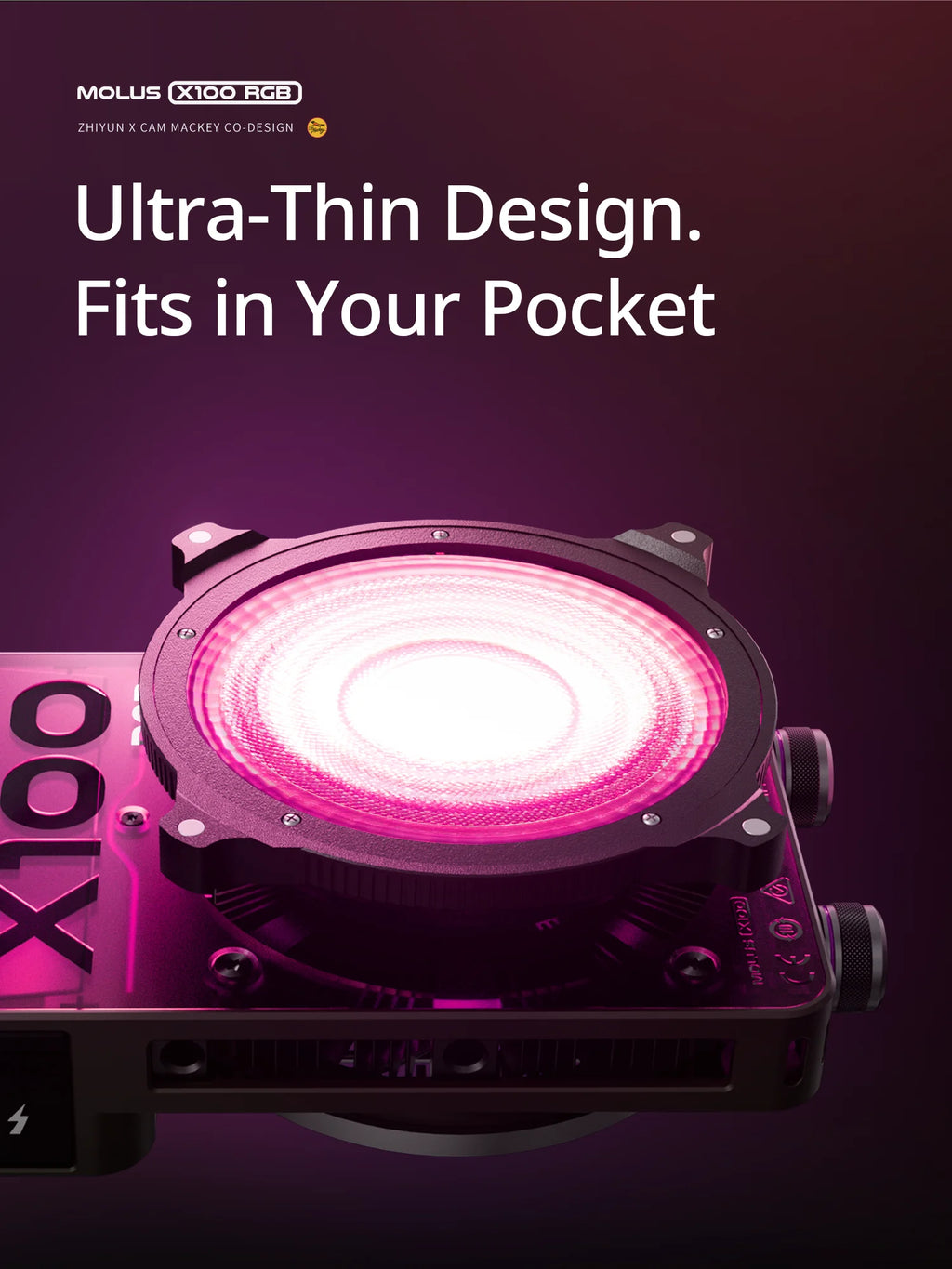 Compact Molus X100 RGB pocket video light with a black rectangular frame and a circular, glowing pink light face.
