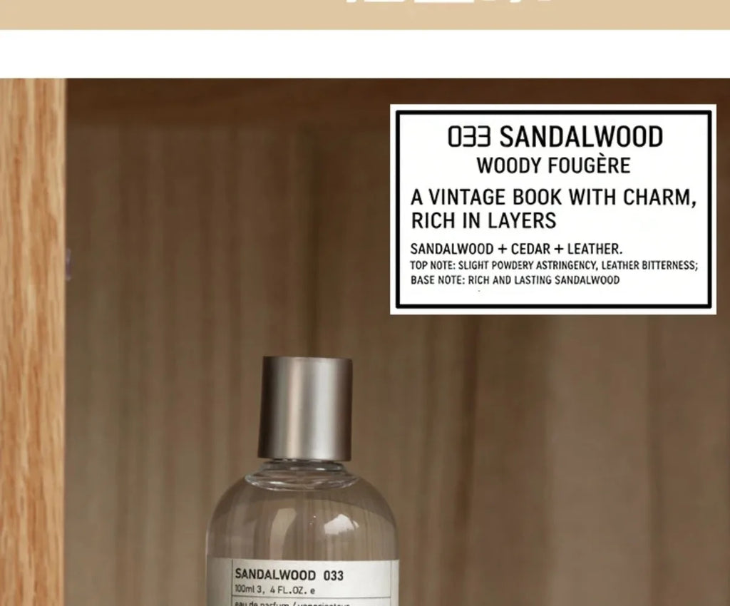 Sandalwood 033 perfume in a 100ml clear glass bottle with a silver cap, featuring woody notes of cedar and leather.